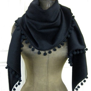 woolshawl with pompons in black image 2