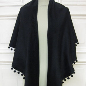 woolshawl with pompons in black image 4