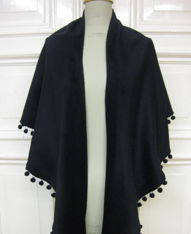 woolshawl with pompons in black image 4