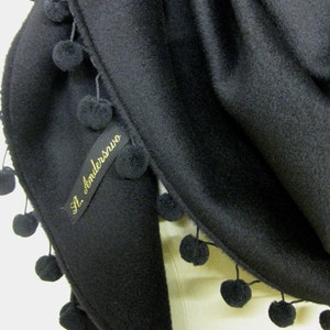 woolshawl with pompons in black image 3