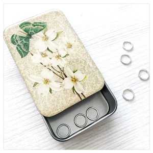 Vintage-Inspired Green Moth and Dogwood Resin Stitch Marker Tin for Spring Knitting
