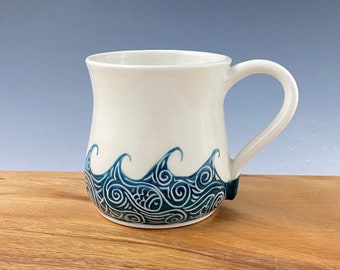 Pottery mug / Porcelain coffee cup, hand thrown and hand painted in wave pattern