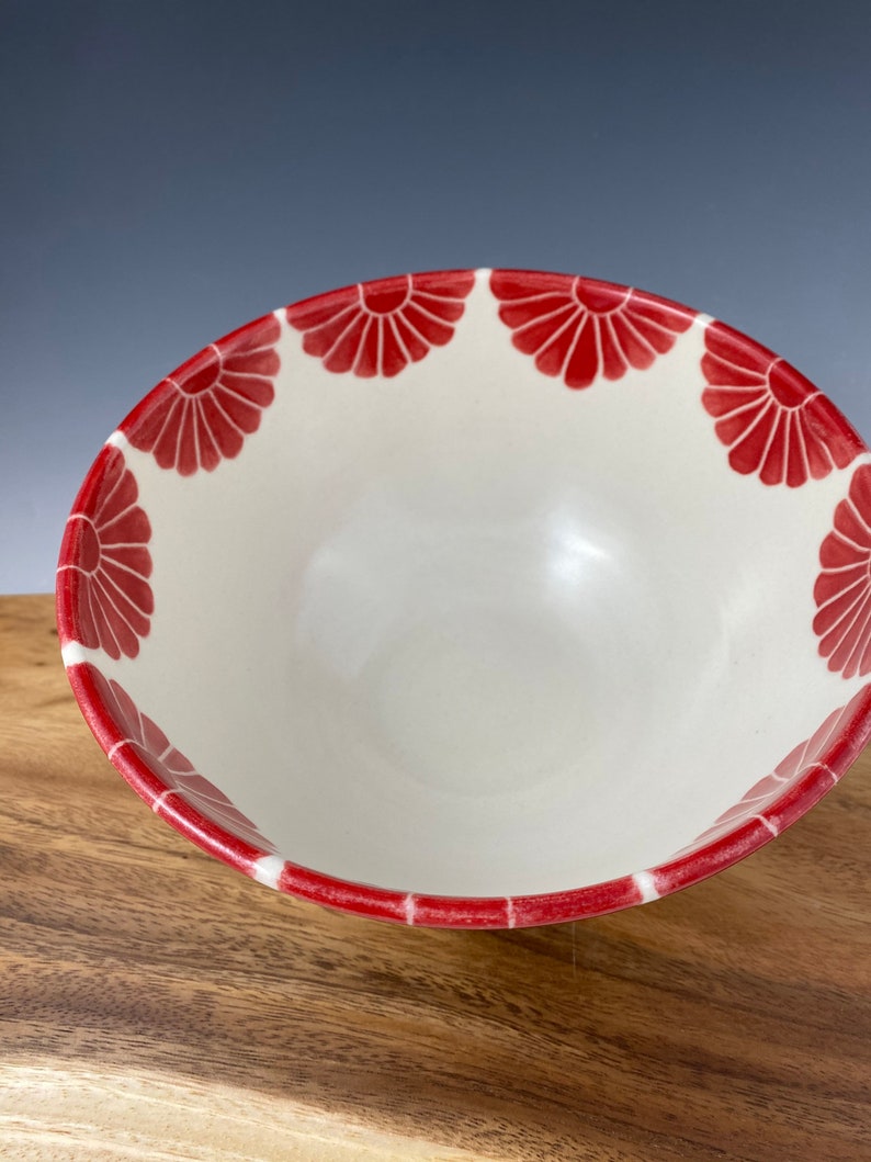 Pottery serving bowl with red flower design image 2