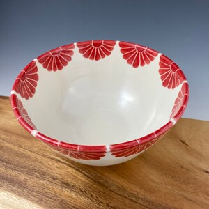 Pottery serving bowl with red flower design image 4