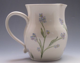 Porcelain pitcher, handthrown and hand painted with forget me nots