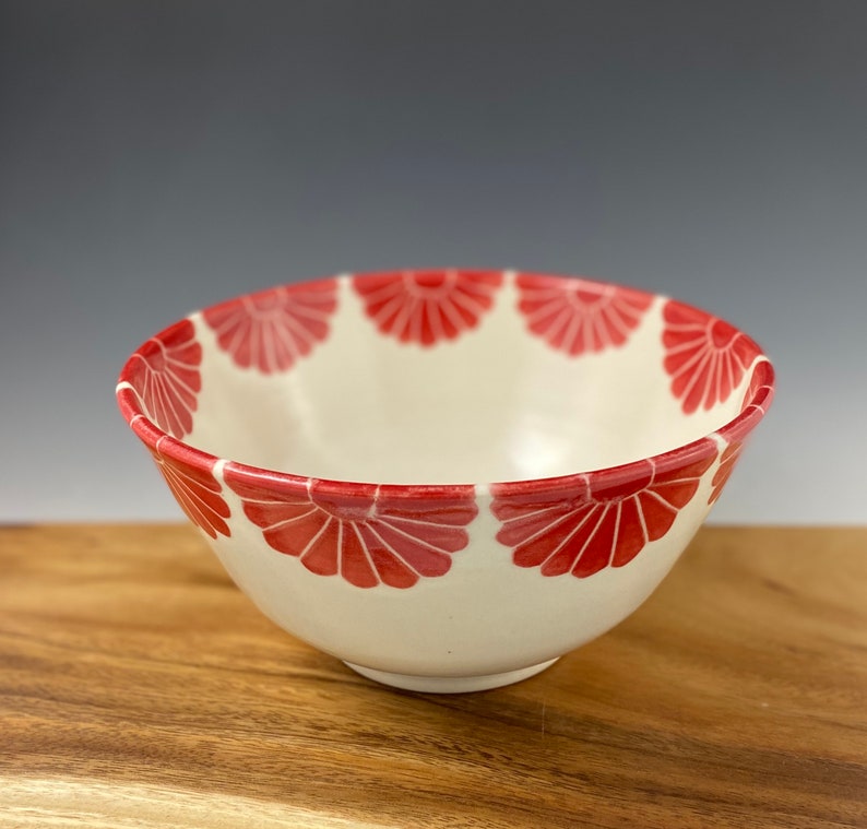 Pottery serving bowl with red flower design image 3