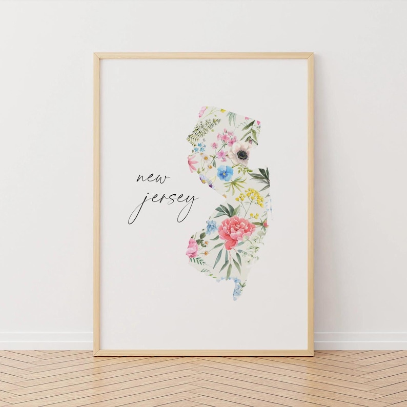May include: A white print with a floral design of the state of New Jersey. The text "new jersey" is written in black cursive script.