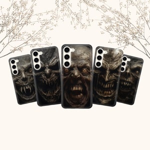 May include: Five phone cases featuring different scary monster faces printed on them. The cases are black and have a camera cutout with three holes.
