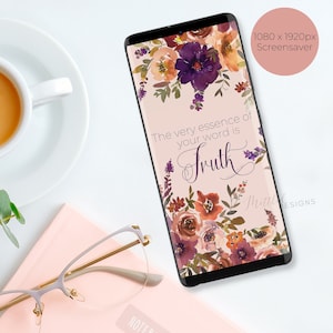 May include: A phone screen displaying a floral design with the text "The very essence of your word is Truth". The background is a light pink color.