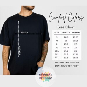 May include: A black short-sleeved t-shirt with a size chart graphic. The chart lists sizes S through 4XL with corresponding length and width measurements in inches. A diagram on the shirt illustrates how to measure width and length for sizing.