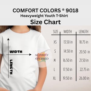 May include: A white Comfort Colors 9018 heavyweight youth t-shirt size chart. The chart lists sizes XS through XL with corresponding width and length measurements in inches, ranging from 13.50 to 19.50 inches wide and 18.75 to 26.00 inches long.