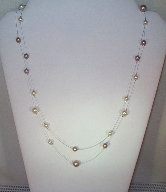 Swarovski Pearl Illusion Necklace Shown in Ivory and Almond on