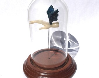 Winged Hand in a Bell Jar