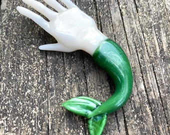 Mer-Hand (Hand with a fish’s tail)