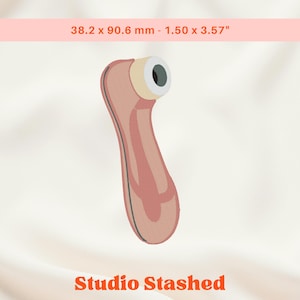 May include: A pink and beige vibrator with a black and white tip. The product is 1.50 x 3.57 inches. The text "Studio Stashed" is in orange at the bottom of the image.