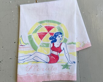 Vintage Florida Souvenir Towel Pretty Girl Sunbathes on the Beach
