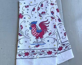 Toalla vintage Startex con diseño estilizado de gallo y mariposa.