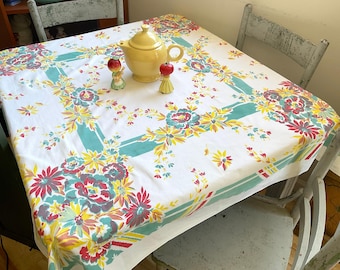 Mantel vintage con ramos de amapolas y margaritas