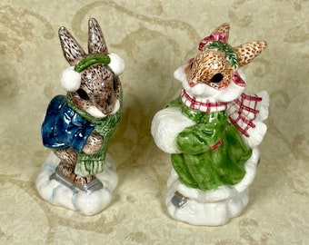 Ice Skating Rabbits by artist Priscilla Hillman Made in 1997 for Enesco Imports salt and pepper