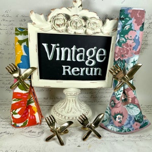 2 sets of 4 vintage cotton floral napkins and 4 napkin rings