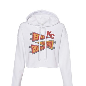 kansas city football crop sweatshirt | super bowl champions football chiefs | super bowl wins 1970 2020 2023 pennant crop hoodie sweatshirt