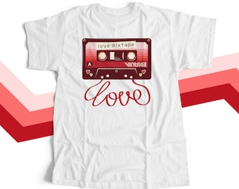 May include: White t-shirt with a red and white cassette tape graphic and the text "love mixtape" and "vintage". The word "love" is written in red cursive below the cassette tape.