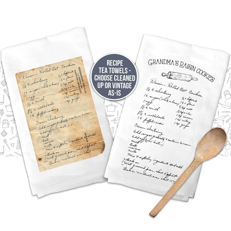 May include: Two white tea towels featuring a printed recipe for Raisin Rolled Oat Cookies. One towel displays a vintage, aged paper appearance with handwritten text, while the other shows a clean, modern version with a rolling pin illustration.