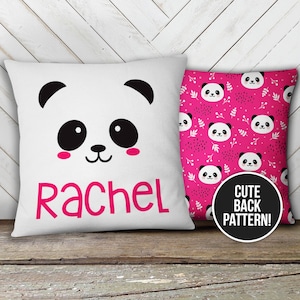 May include: White pillow with a cute panda face and the name "Rachel" in pink lettering. The back of the pillow has a pink background with a repeating pattern of panda faces, leaves, and dots. The text "Cute Back Pattern!" is written in a black circle on the back of the pillow.