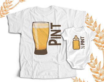 May include: A white t-shirt with a glass of beer and the word "PINT" printed on it. A white baby onesie with a baby bottle and the words "1/2 PINT" printed on it.