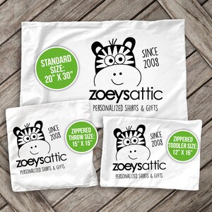 May include: Three white pillowcases with black and white zebra print designs. Each pillowcase has a green circle with text that says "zoeysattic" and "personalized shirts & gifts". The pillowcases are available in three sizes: standard (20" x 30"), throw (15" x 15"), and toddler (12" x 16").