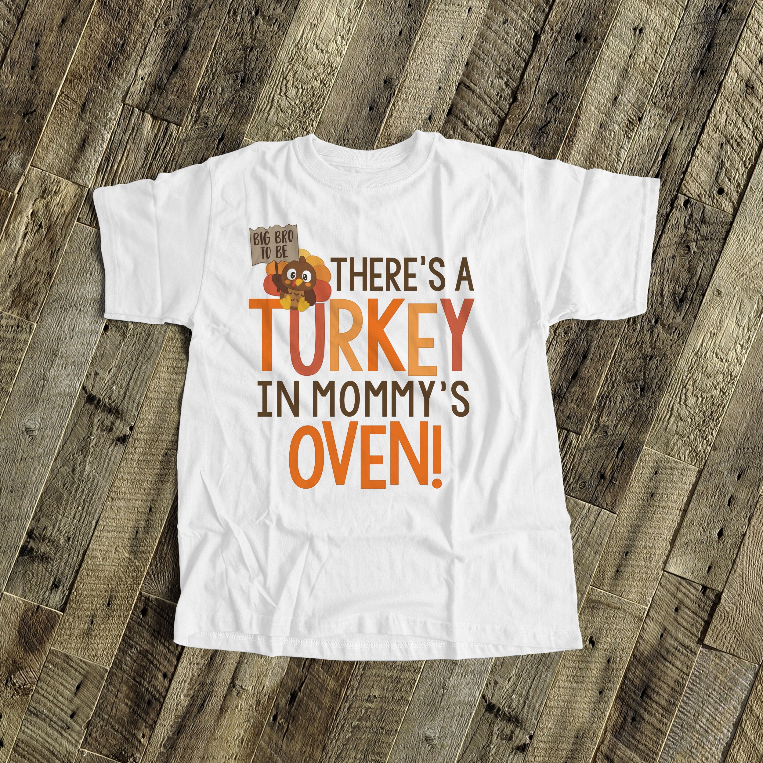 There's A Turkey In Mommy's Oven Thanksgiving Pregnancy Gift T-Shirt There's A Turkey In Mommy's Oven Thanksgiving Pregnancy Gift T-Shirt