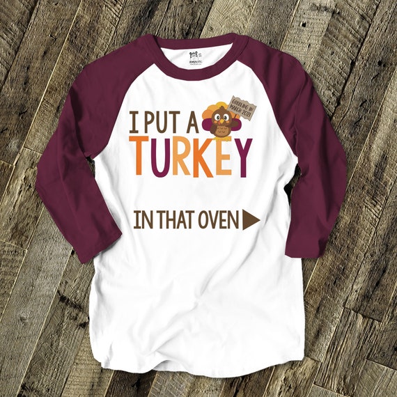 Daddy Thanksgiving shirt-  i put a turkey in that oven pregnancy announcement unisex adult raglan maroon sleeve shirt 22SNLF-014-BR
