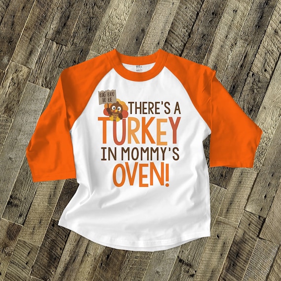 Thanksgiving There Is A Turkey In Mommy's Oven New Sibling T-Shirt Thanksgiving There Is A Turkey In Mommy's Oven New Sibling T-Shirt