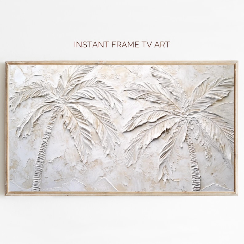 May include: A framed wall art print featuring a white textured background with two white palm trees. The print has a light brown wood frame.