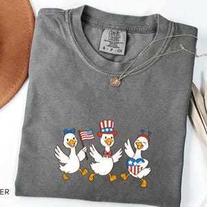 Fourth of July Duck Shirt, Funny Patriotic Animal Tee, USA Comfort Colors Graphic Shirt, Red White and Blue Summer Farm Shirt for Women