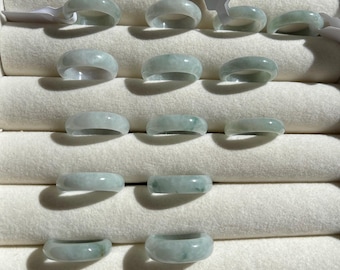 Light mint green Burmese jadeite jade rings, assorted sizes.