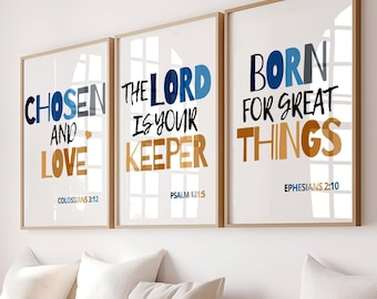 May include: Three framed art prints with inspirational quotes. The prints feature the phrases "Chosen and Love", "The Lord is Your Keeper", and "Born for Great Things" in blue, gold, and black lettering. Below the prints are white pillows and a woven basket.