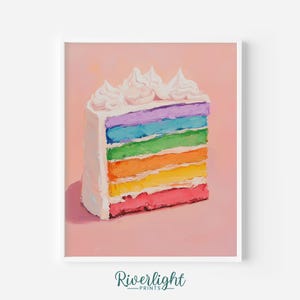 May include: A framed print featuring a slice of rainbow cake. The cake has layers of red, yellow, orange, green, blue, and purple, topped with white frosting. The background is a soft pink.