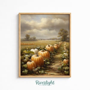 Puede incluir: Una impresión artística enmarcada que representa un campo de calabazas bajo un cielo nublado. La escena muestra hileras de calabazas naranjas entre enredaderas y follaje verde, extendiéndose por un campo hacia árboles lejanos bajo un cielo suave.