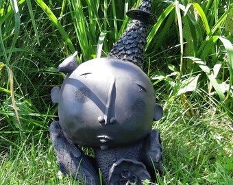 Handmade ceramic sculpture. Textured black clay.