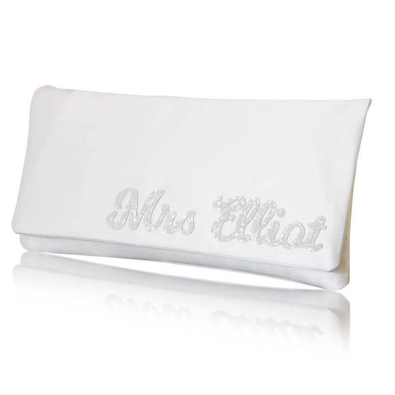 Ivory satin MRS bridal clutch for wedding day.  It can be personalised with the brides new surname, made from ivory glitter.