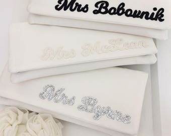 Ivory personalised MRS surname satin wedding day bridal clutch purse