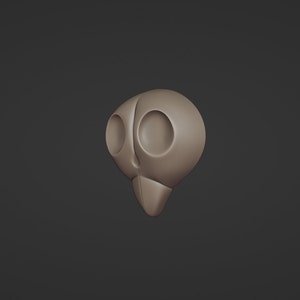 May include: A light brown, stylized owl skull with large, round eye sockets and a pointed beak. The skull is smooth and appears to be a 3D-printed object, set against a dark gray background.