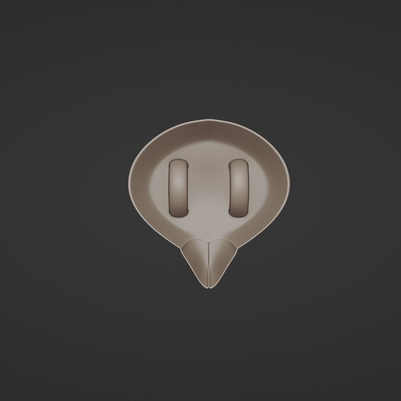 May include: A light brown, abstract-shaped object with two rectangular cutouts and a pointed bottom. The object is centered against a dark gray background, with a smooth, matte finish.