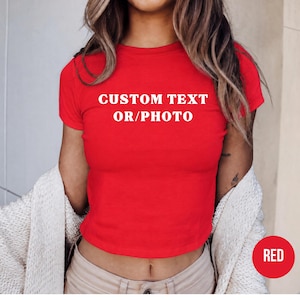 A woman wearing a red cropped top with the text "CUSTOM TEXT OR/PHOTO" printed on it.