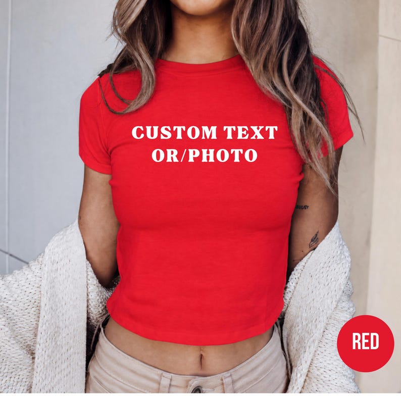 A woman wearing a red cropped top with the text "CUSTOM TEXT OR/PHOTO" printed on it.