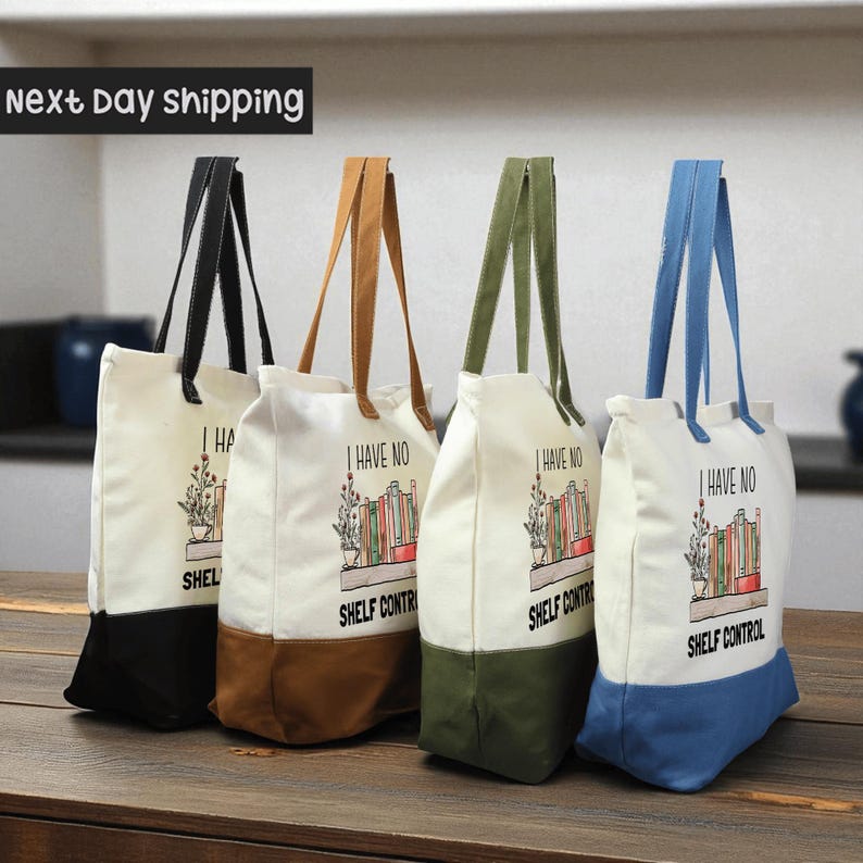 four tote bags with the text "I HAVE NO SHELF CONTROL" printed on them.