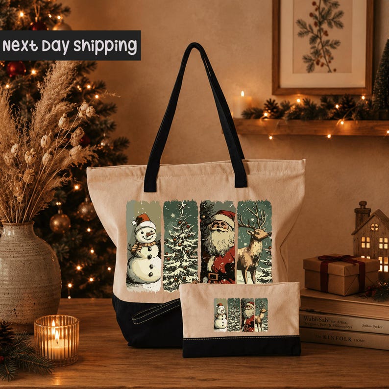 a beige tote bag with a winter-themed design, including a snowman, Santa Claus, and reindeer, as well as a small pouch with a similar design. The bag and pouch are placed on a wooden surface, with a Christmas tree, a vase, and a candle in the background.