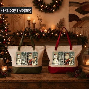 two tote bags with Christmas-themed designs, including a snowman, reindeer, and Christmas tree, placed on a wooden surface against a festive background with Christmas lights and decorations.