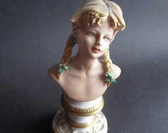 Vintage Porcelain Figurine of Girl with Braids on Pedestal